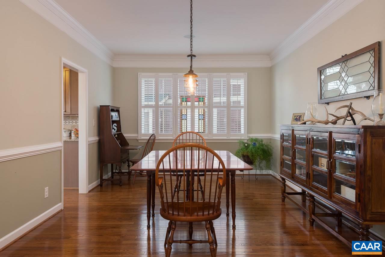 806 Village Road Charlottesville, VA 22903 - Photo 11 of 20 a view of a livingroom with furniture window and wooden floor