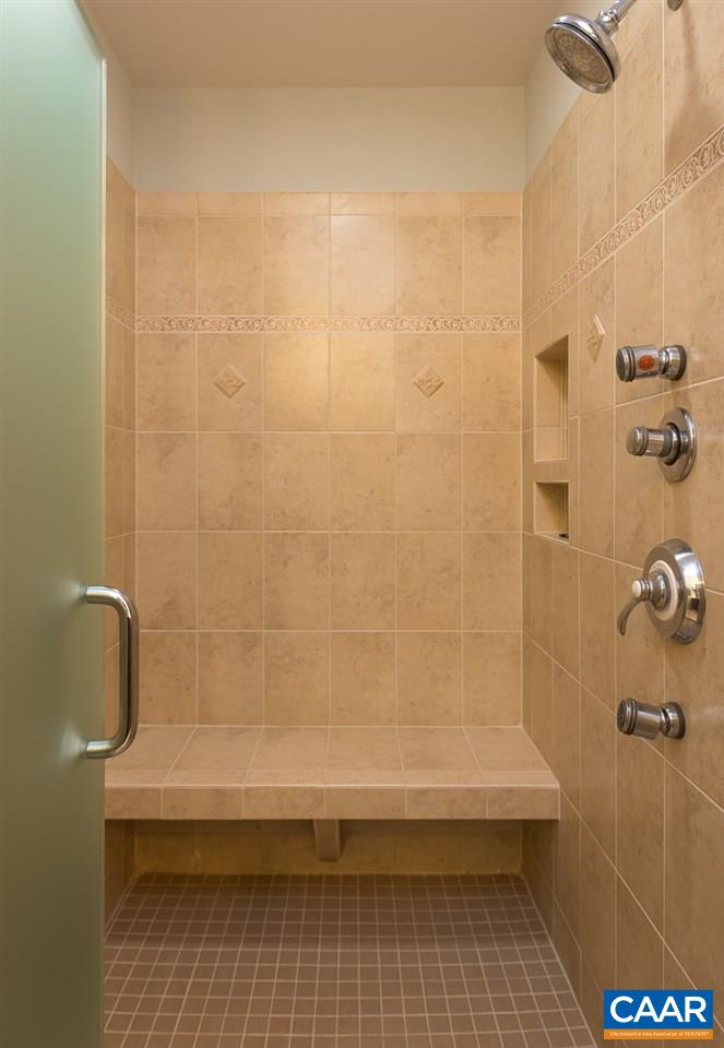 806 Village Road Charlottesville, VA 22903 - Photo 15 of 20 a bathroom with a shower