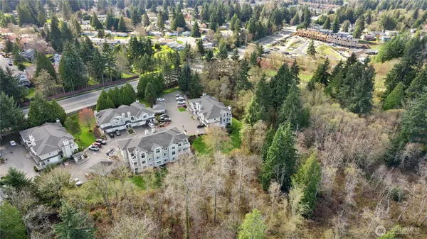 an aerial view of residential house with outdoor space