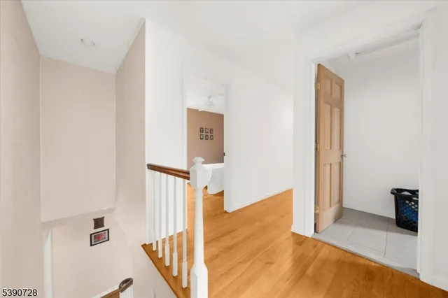 a view of a hallway with front door