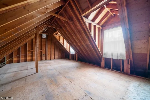 a view of an empty room with a balcony