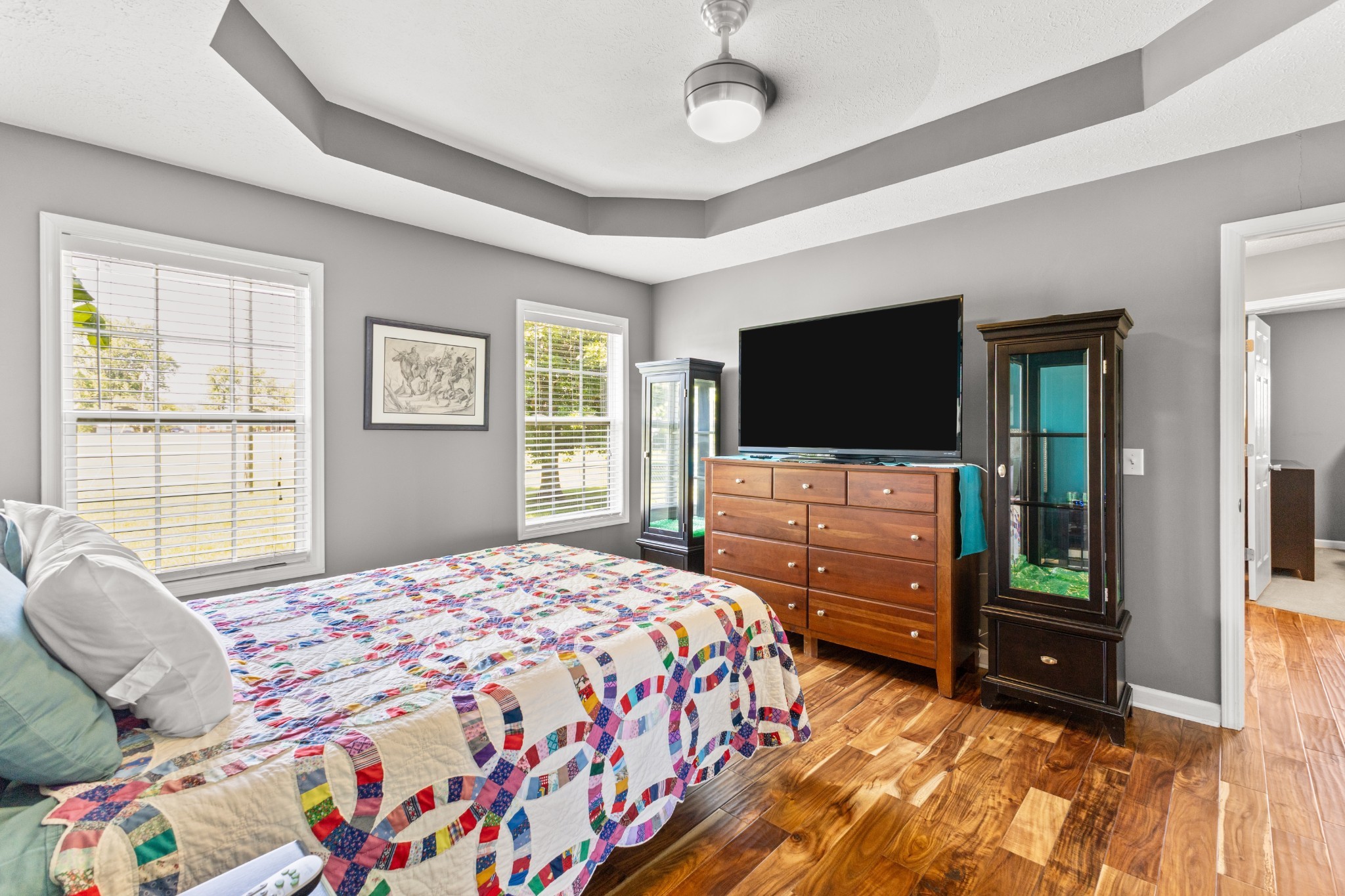 1010 Jacob's Valley Road Joelton, TN 37080 - Photo 9 of 33 a bedroom with a bed and a flat screen tv
