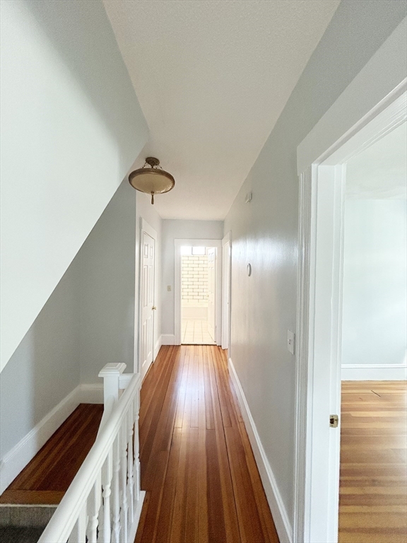 80 Linden Street, Unit 80 Salem, MA 01970 - Photo 15 of 35 a view of a hallway view with wooden floor