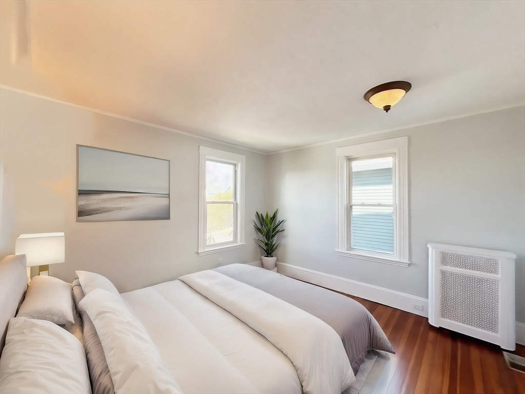 80 Linden Street, Unit 80 Salem, MA 01970 - Photo 18 of 35 a bedroom with a bed and a window