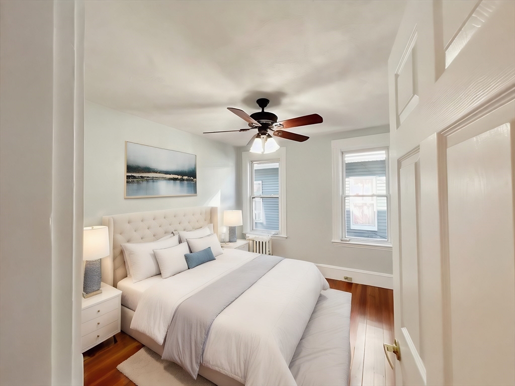 80 Linden Street, Unit 80 Salem, MA 01970 - Photo 21 of 35 a bedroom with a bed furniture and a window