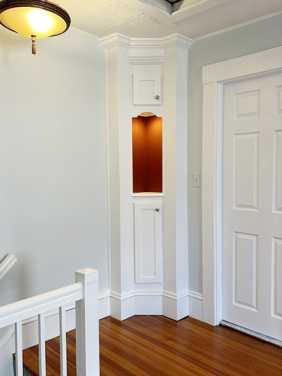 80 Linden Street, Unit 80 Salem, MA 01970 - Photo 27 of 35 a bedroom with a bed and a mirror