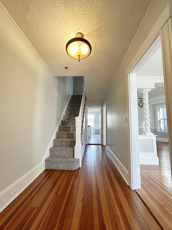 80 Linden Street, Unit 80 Salem, MA 01970 - Photo 3 of 35 a view of gallery with wooden floor