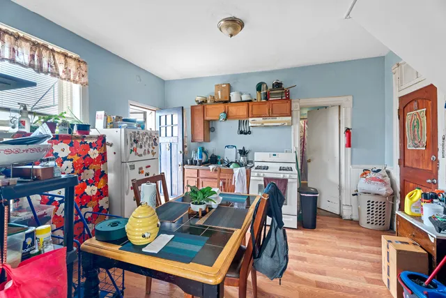 a bedroom with a bed and cabinets