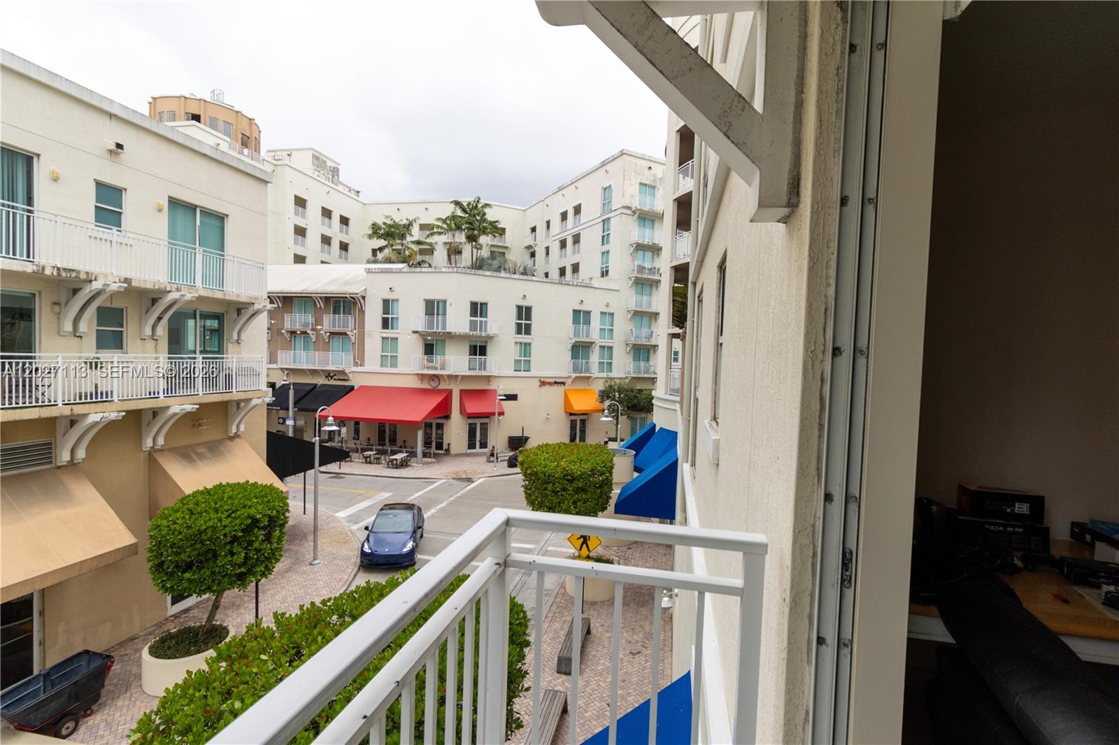 7275 Southwest 90th Way, Unit 213 Miami, FL 33156 - Photo 18 of 31 a view of building from the balcony