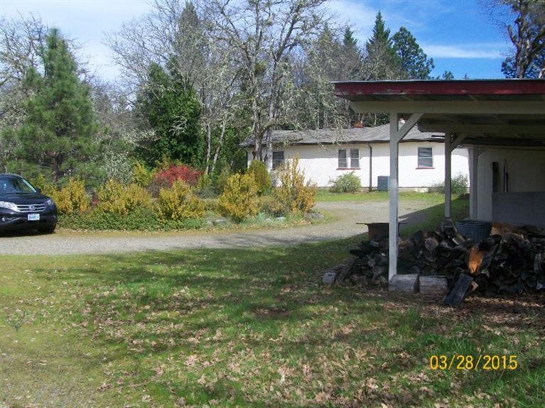 5015 Waldo Road Cave Junction, OR 97523 - Photo 30 of 35 a view of outdoor space and garden