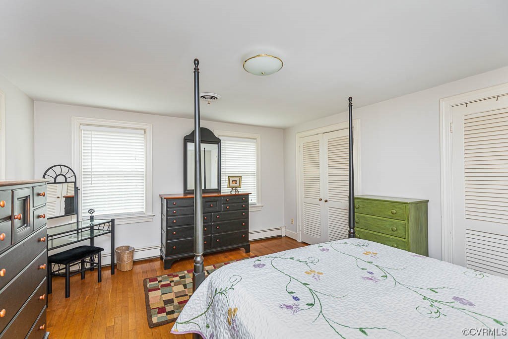 13341 Starcross Road Midlothian, VA 23113 - Photo 29 of 39 a bedroom with a bed and a dresser