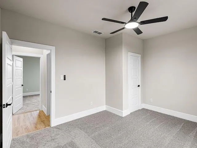 a view of a room with rack and wooden floor