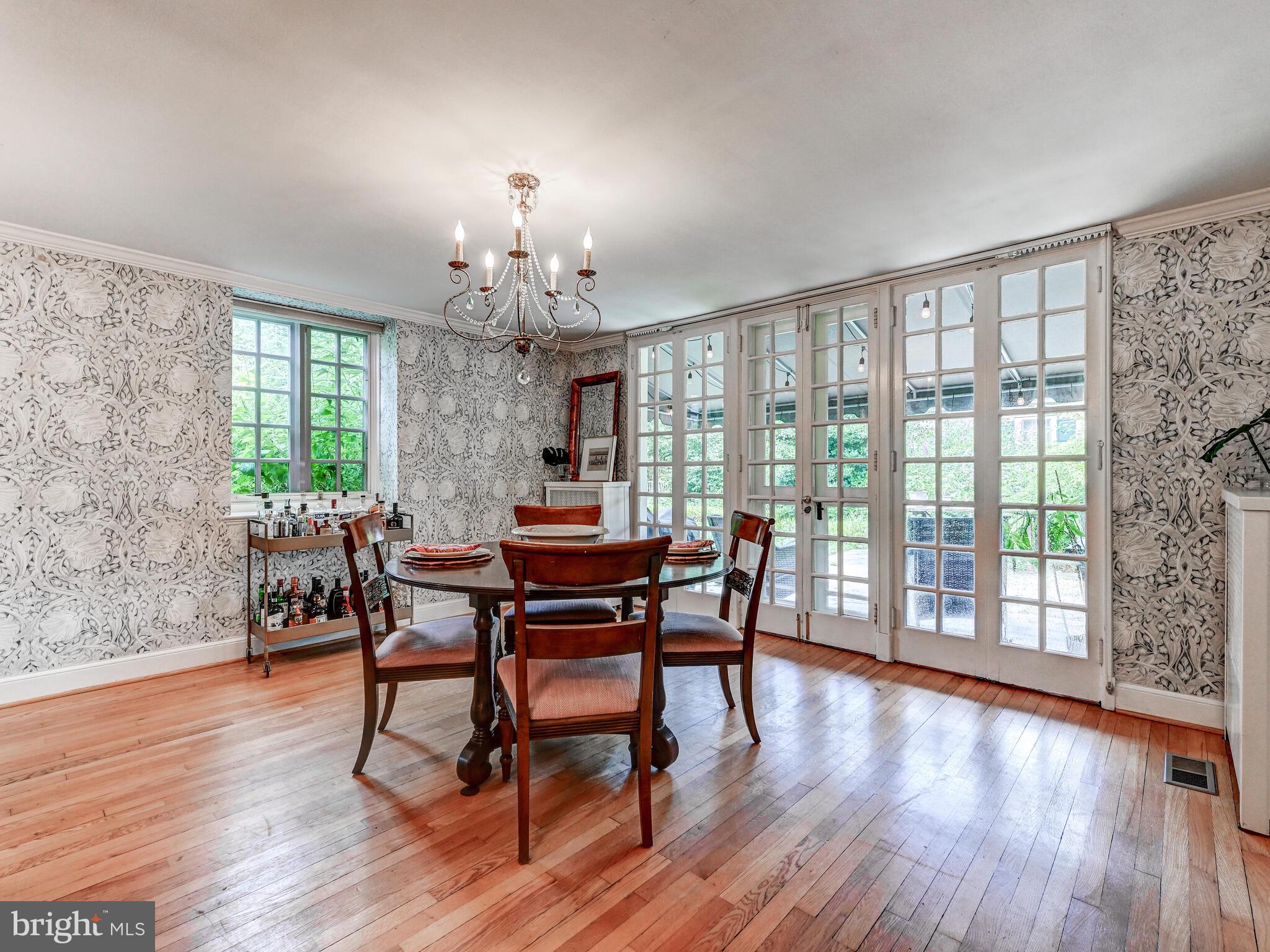209 Paddington Road Baltimore, MD 21212 - Photo 12 of 36 a view of a dining room with furniture and wooden floor