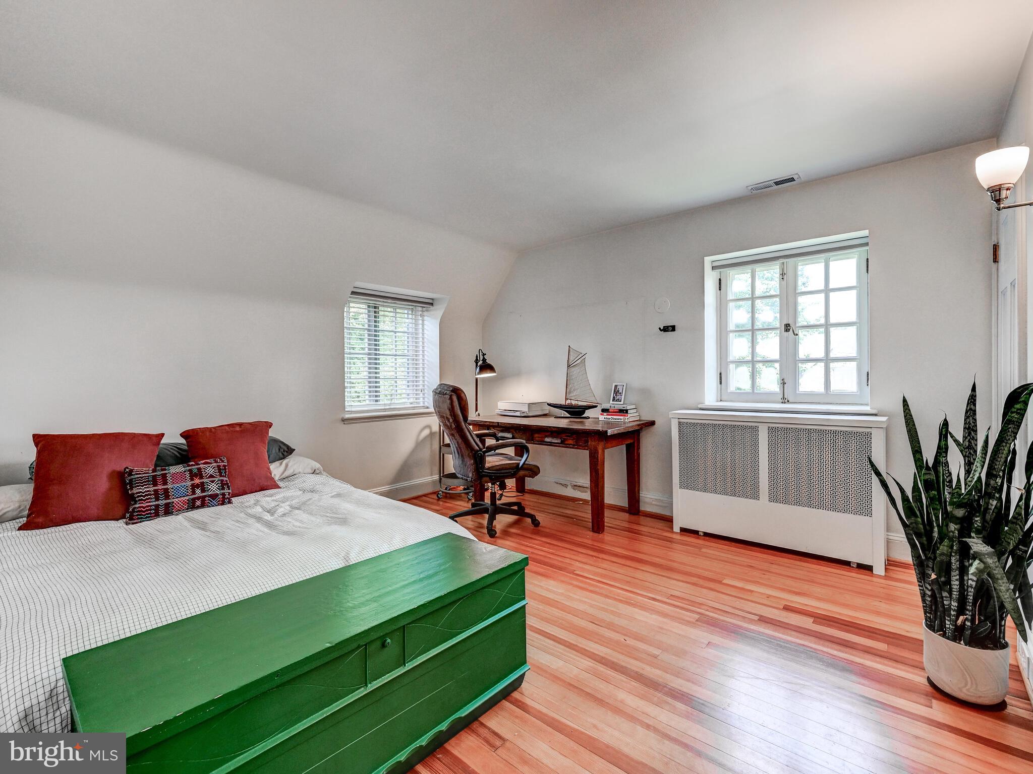 209 Paddington Road Baltimore, MD 21212 - Photo 25 of 36 a bedroom with a bed and a window