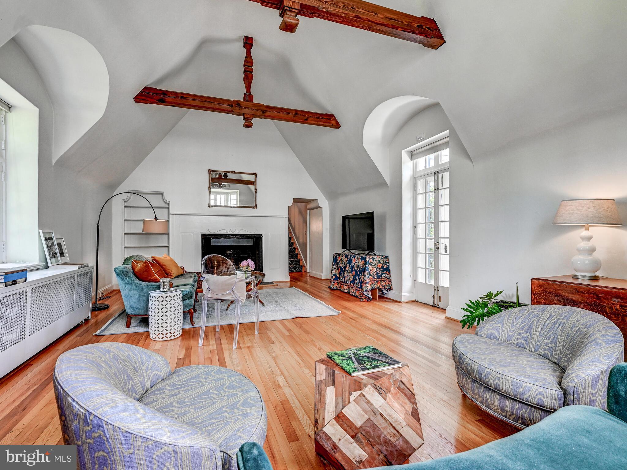 209 Paddington Road Baltimore, MD 21212 - Photo 9 of 36 a living room with furniture and a fireplace