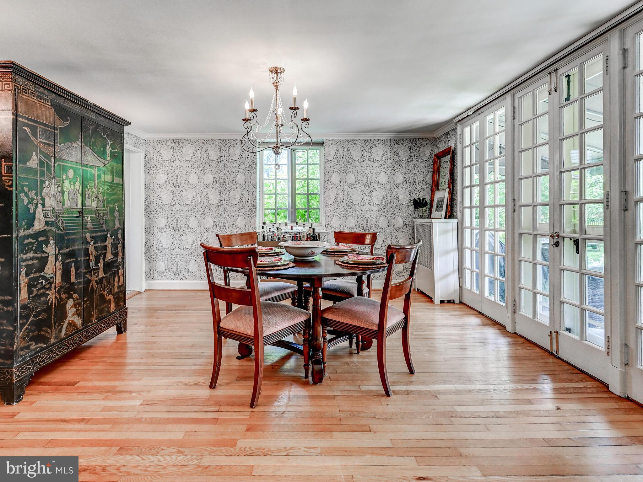 209 Paddington Road Baltimore, MD 21212 - Photo 10 of 36 a view of a dining room with furniture window and wooden floor
