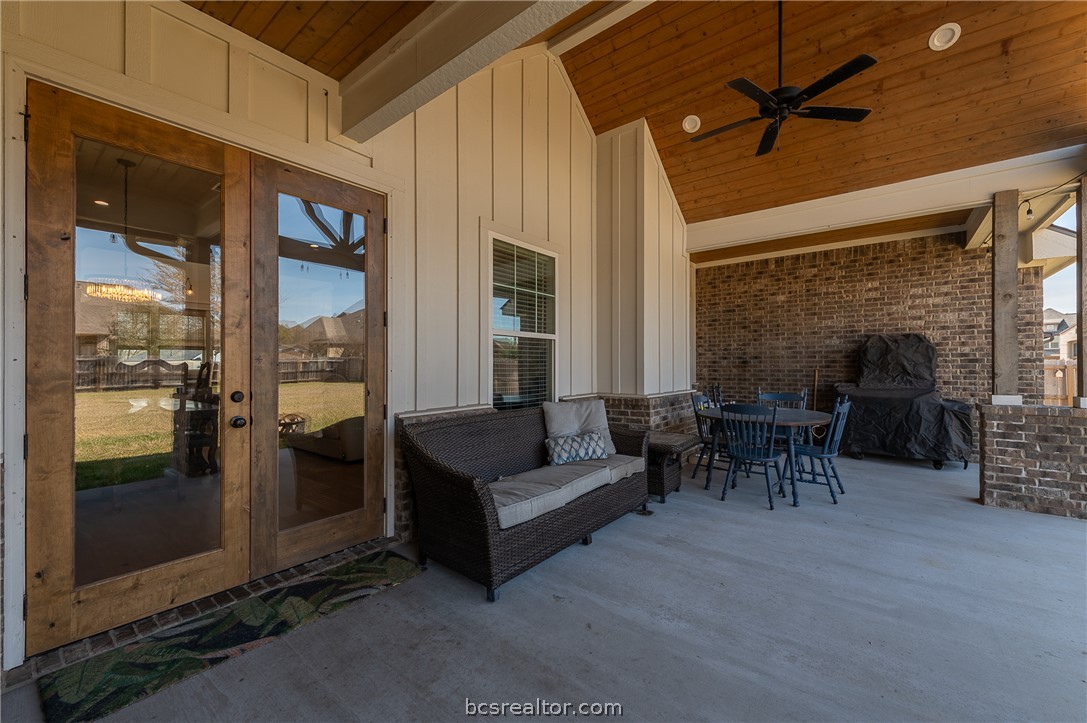 3317 Stone Leigh Lane Bryan, TX 77808 - Photo 26 of 30 a living room with furniture and a table