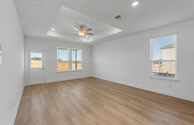 a kitchen with stainless steel appliances a sink stove and microwave