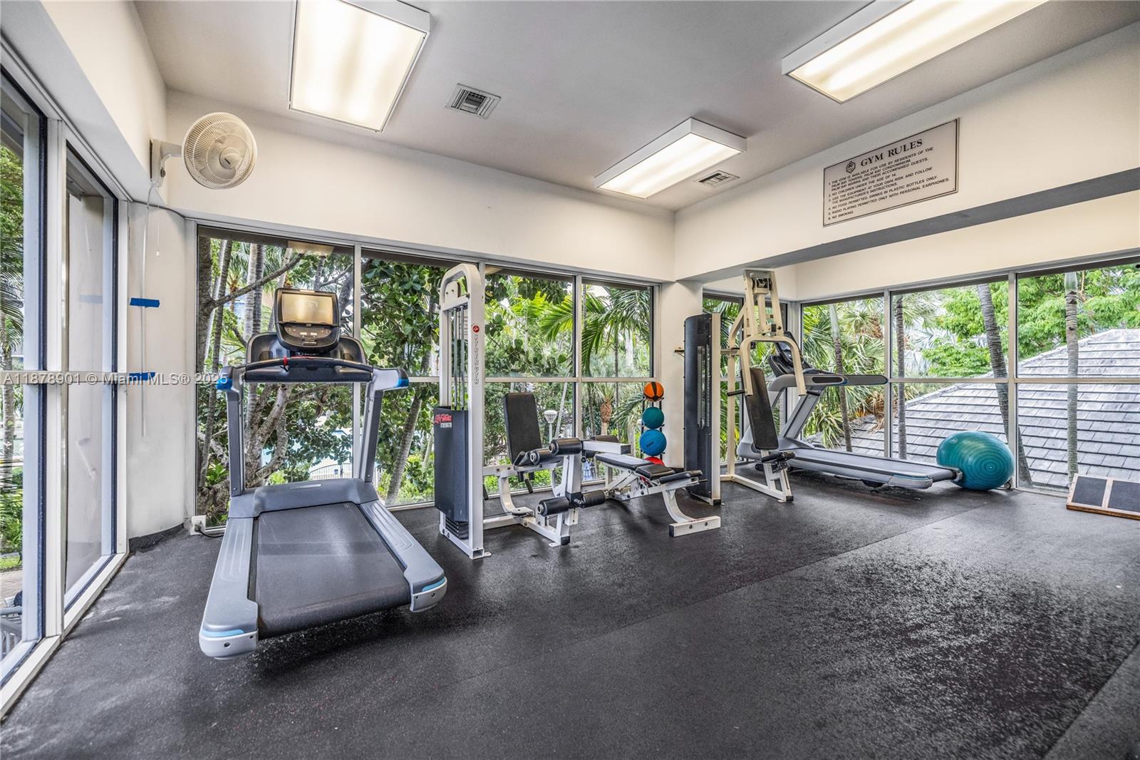 770 Northeast 69th Street, Unit 6H Miami, FL 33138 - Photo 40 of 71 a view of a room with gym equipment