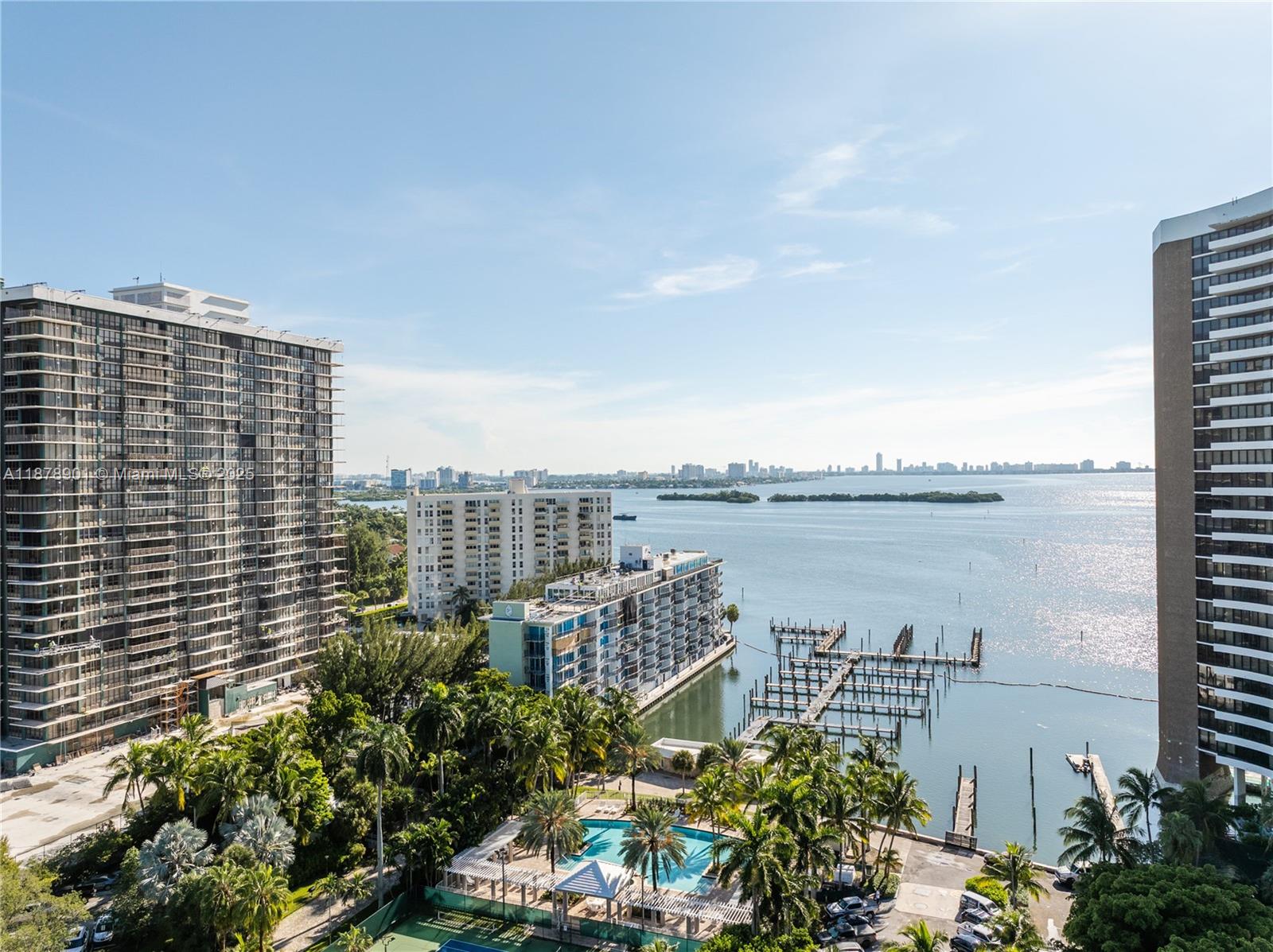770 Northeast 69th Street, Unit 6H Miami, FL 33138 - Photo 43 of 71 a view of a lake with a city skyline in the background