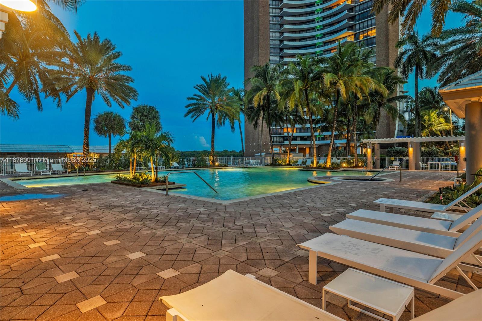 770 Northeast 69th Street, Unit 6H Miami, FL 33138 - Photo 46 of 71 a view of a yard with palm trees