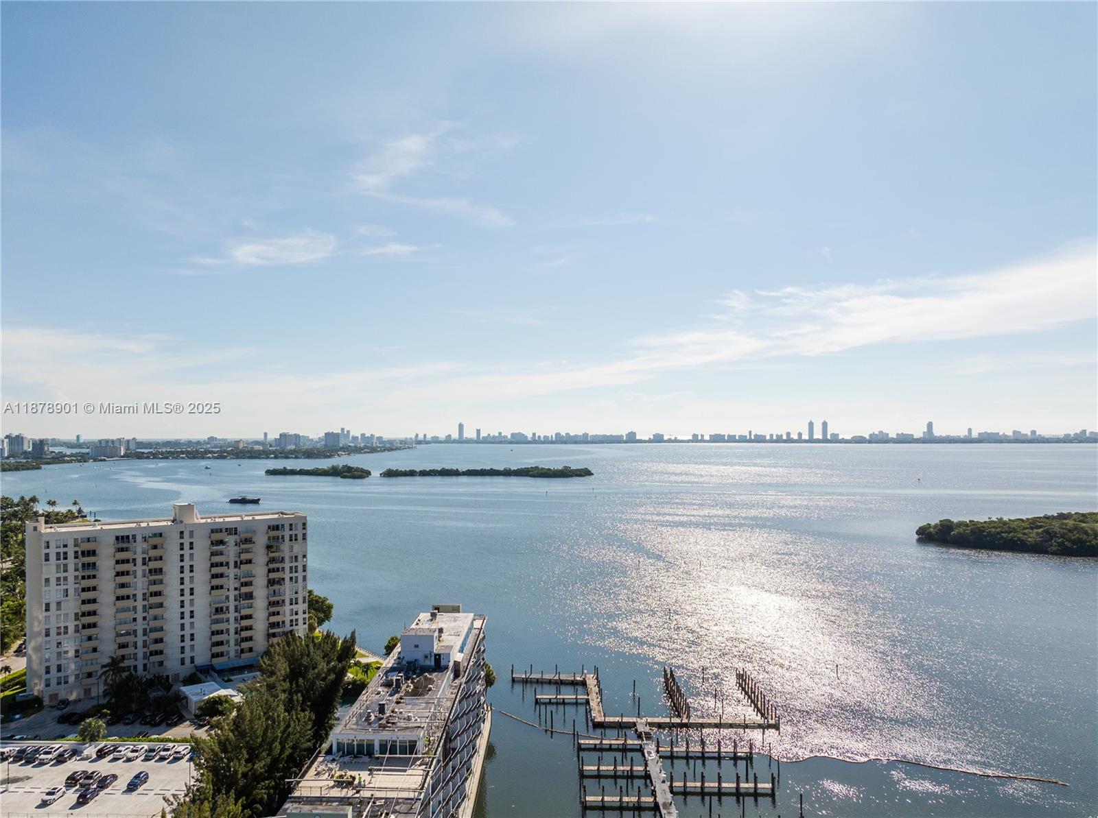 770 Northeast 69th Street, Unit 6H Miami, FL 33138 - Photo 7 of 71 a view of a lake with a city skyline in the background
