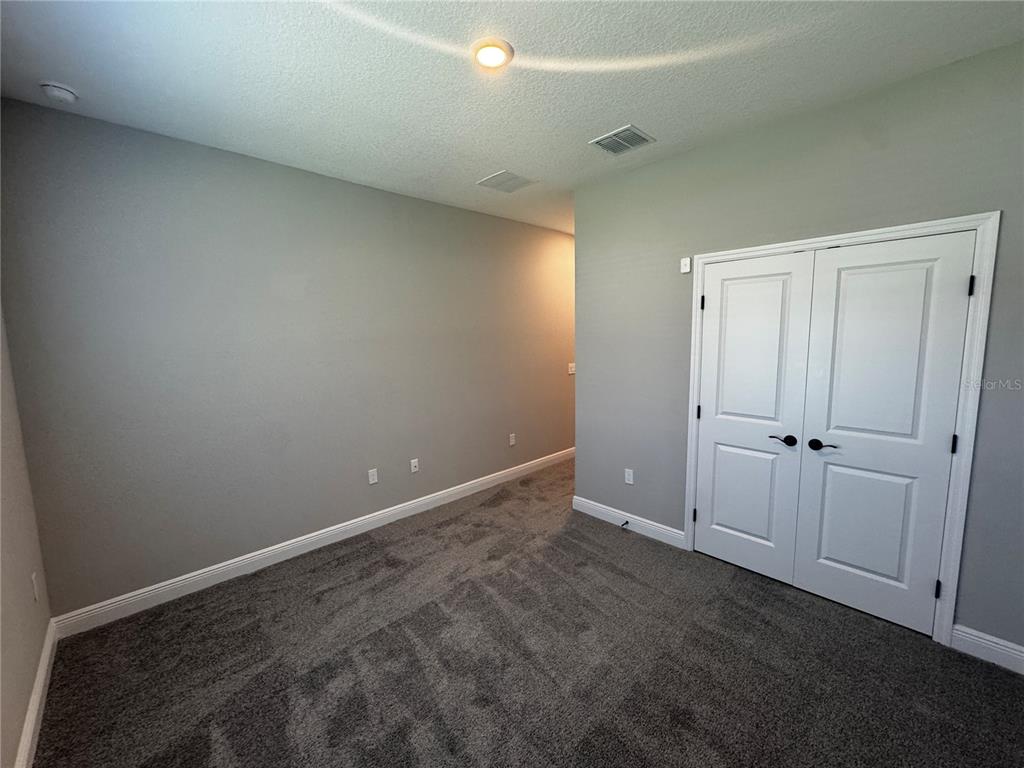 13101 Southwest 72nd Terrace Road Ocala, FL 34473 - Photo 12 of 18 a view of an empty room