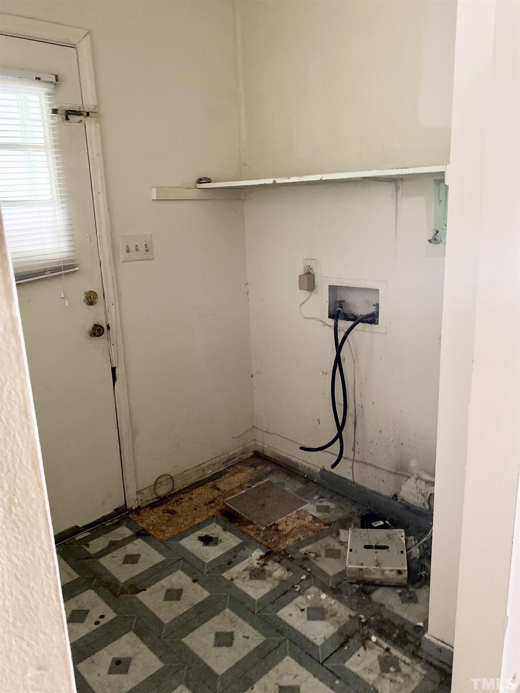 102 St Augustine Raleigh, NC 27610 - Photo 8 of 11 a bathroom with a granite countertop sink and a mirror