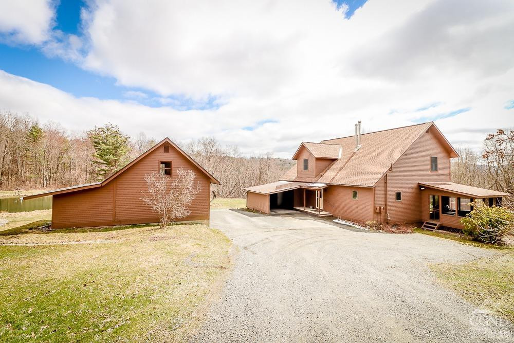 286 West Hill Road New Lebanon, NY 12125 - Photo 1 of 36 a view of a house with a yard