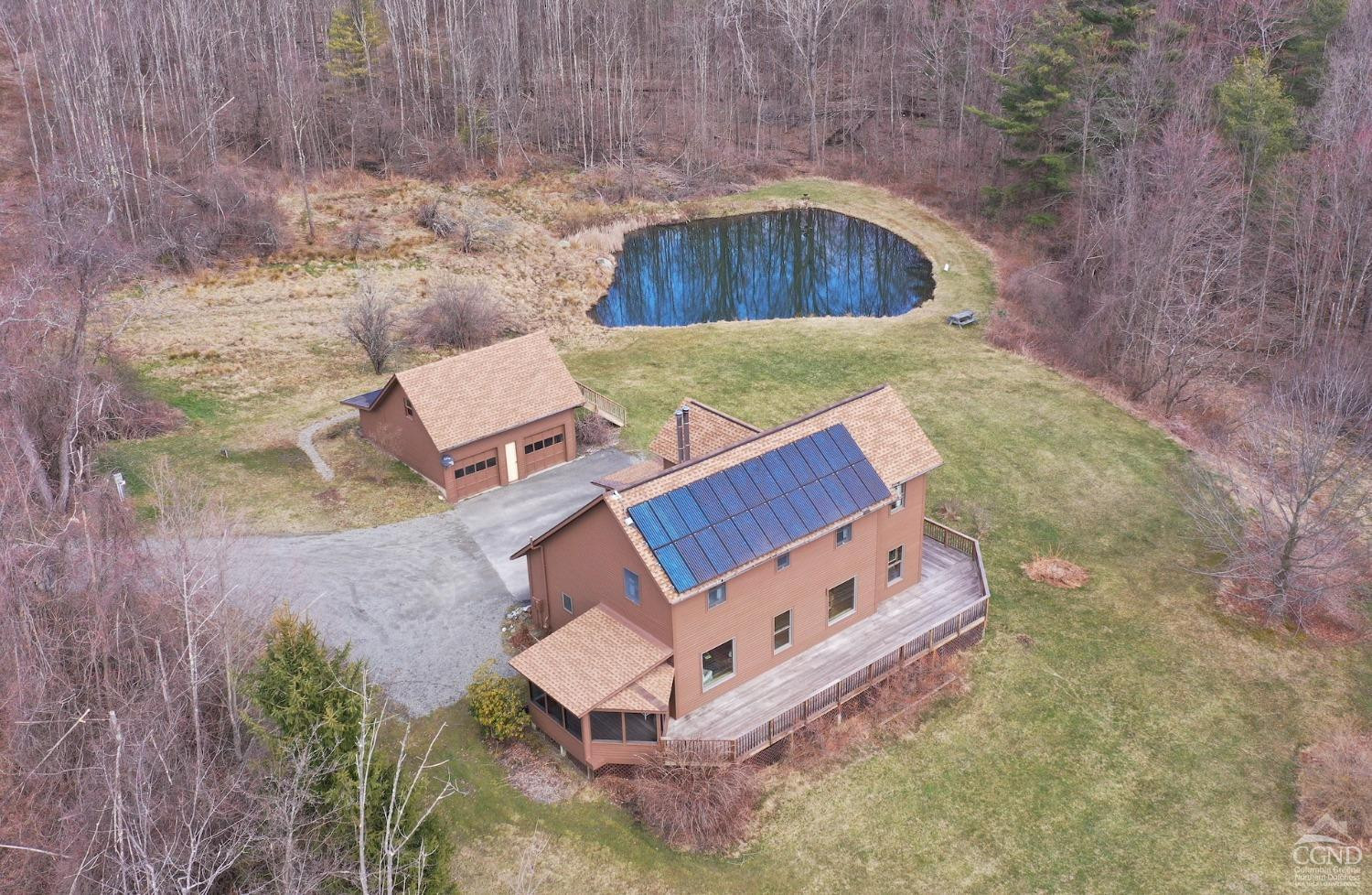 286 West Hill Road New Lebanon, NY 12125 - Photo 2 of 36 an aerial view of a house with a yard and trees