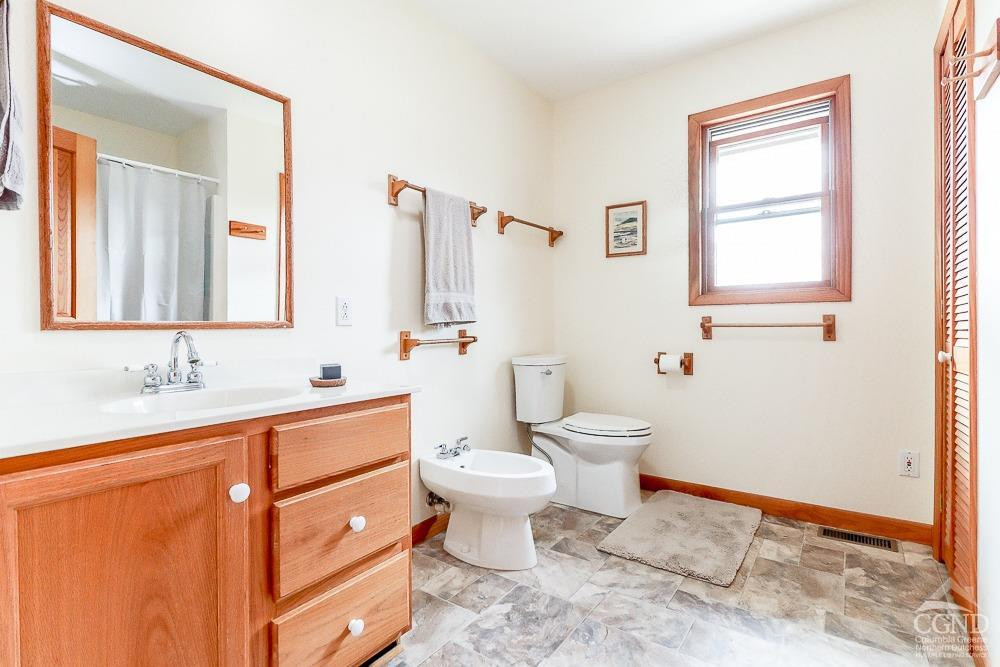 286 West Hill Road New Lebanon, NY 12125 - Photo 21 of 36 a bathroom with a toilet sink and mirror