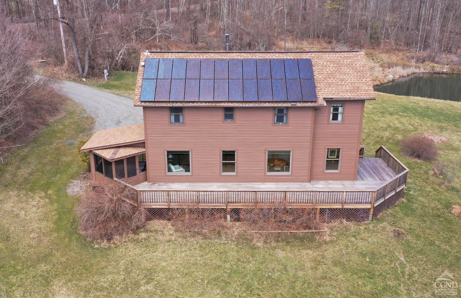 286 West Hill Road New Lebanon, NY 12125 - Photo 3 of 36 a aerial view of a house with a yard and large tree