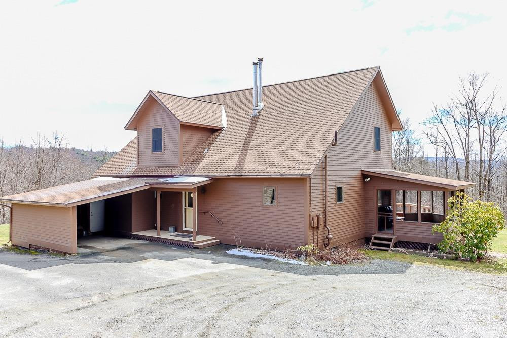286 West Hill Road New Lebanon, NY 12125 - Photo 35 of 36 a front view of a house with a garage