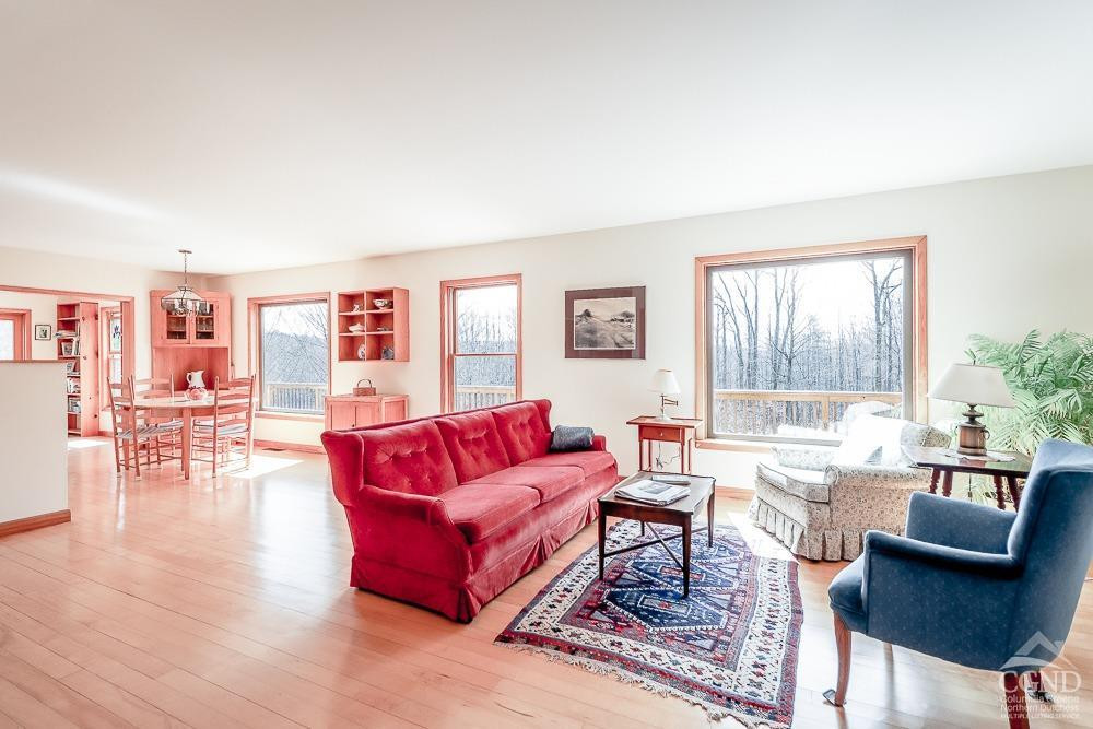 286 West Hill Road New Lebanon, NY 12125 - Photo 4 of 36 a living room with furniture and a window