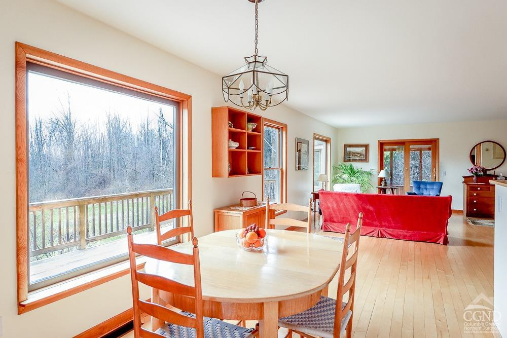 286 West Hill Road New Lebanon, NY 12125 - Photo 8 of 36 a view of a dining room with furniture window and wooden floor
