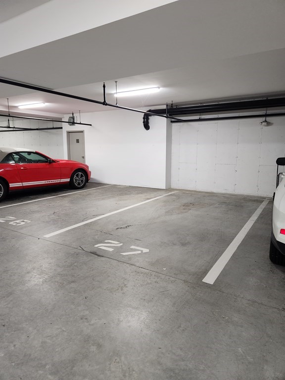 11 Executive Drive, Unit 118 Stoneham, MA 02180 - Photo 34 of 36 a view of parking garage with cars