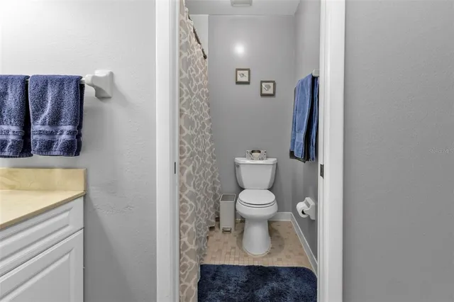 a bathroom with a toilet and a sink