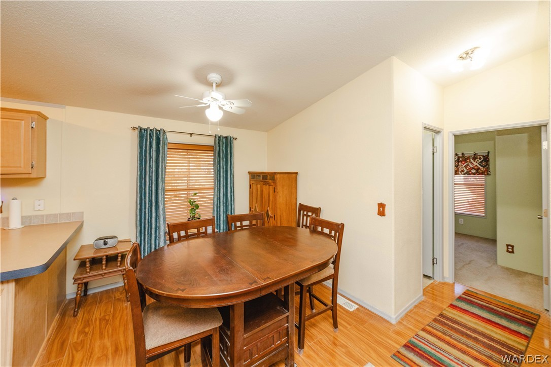 3176 West Malibu Road Golden Valley, AZ 86413 - Photo 9 of 62 Dining Area