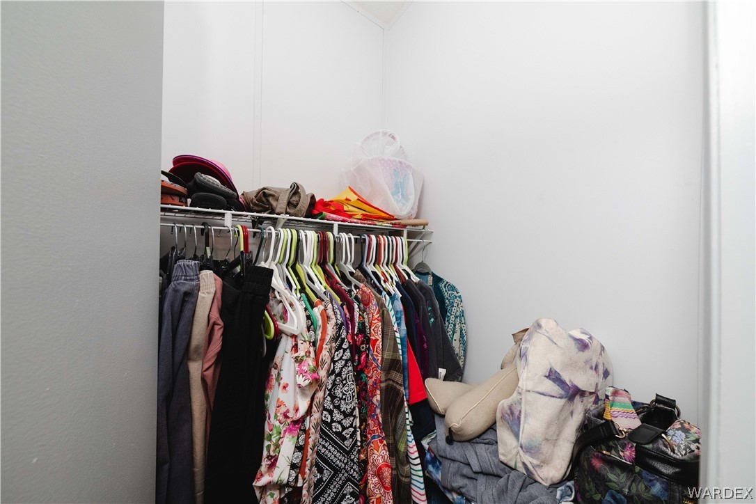 3176 West Malibu Road Golden Valley, AZ 86413 - Photo 17 of 62 Closet in the primary bedroom