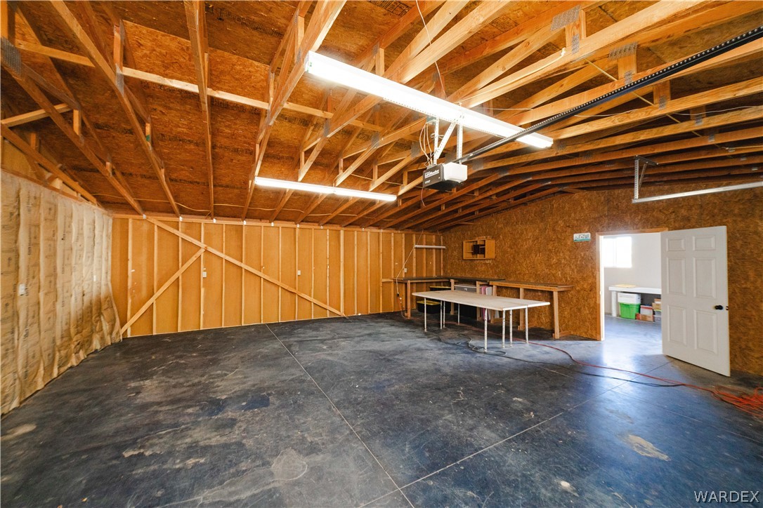 3176 West Malibu Road Golden Valley, AZ 86413 - Photo 27 of 62 Spacious garage with ample workspace