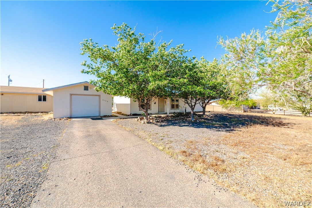 3176 West Malibu Road Golden Valley, AZ 86413 - Photo 35 of 62 Mature landscaping