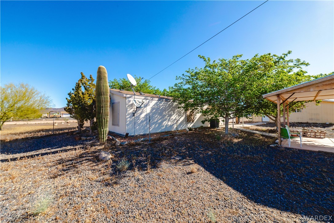 3176 West Malibu Road Golden Valley, AZ 86413 - Photo 39 of 62 View of the house from the backyard