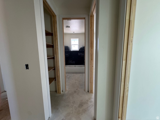 5005 North 75 East Enoch, UT 84721 - Photo 9 of 37 Hallway featuring unfinished concrete flooring