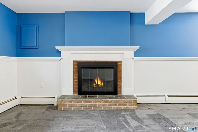 a living room with a fireplace