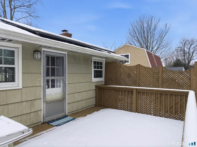 a view of a house with a roof deck