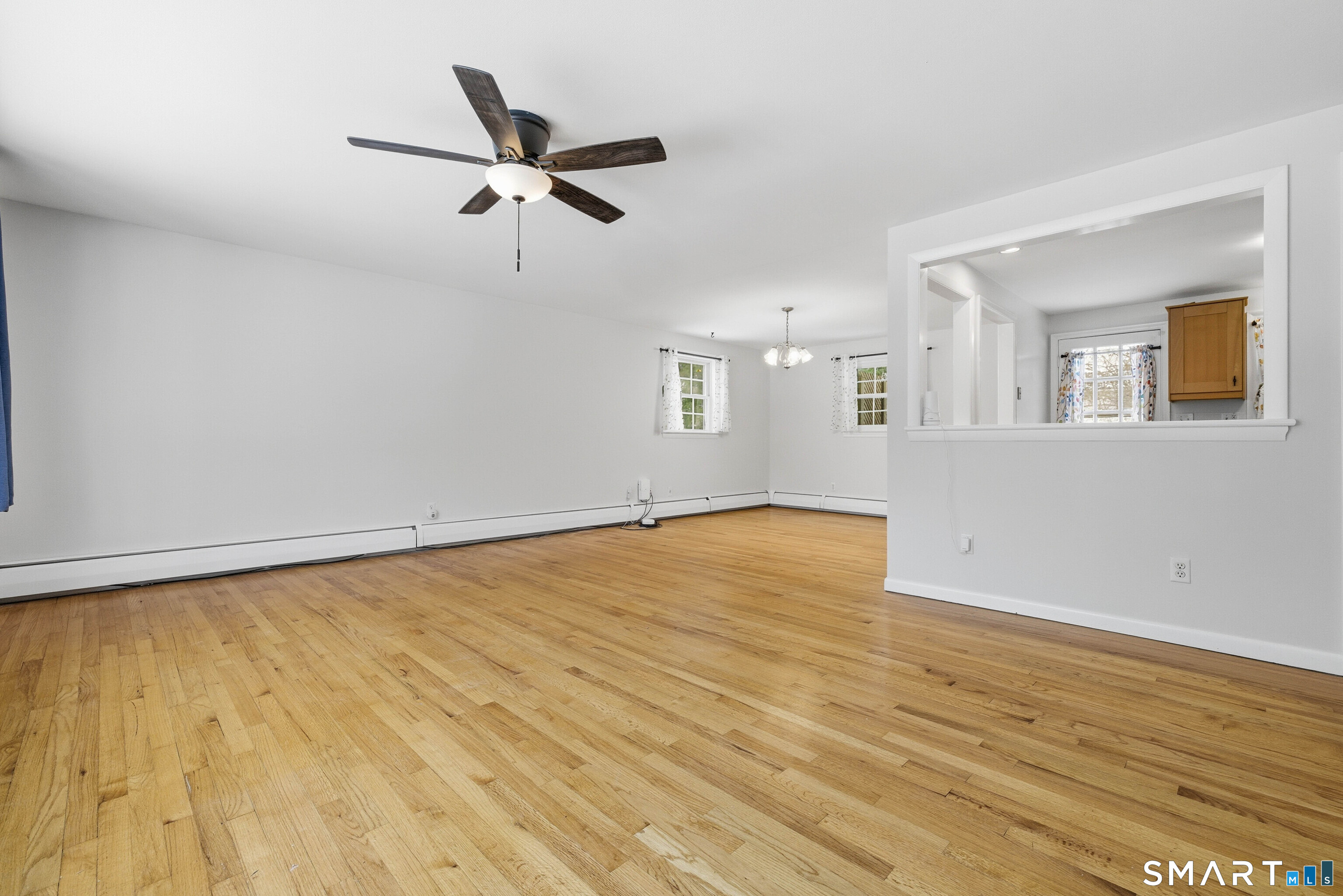10 College Street Clinton, CT 06413 - Photo 7 of 40 Large living room and dining room
