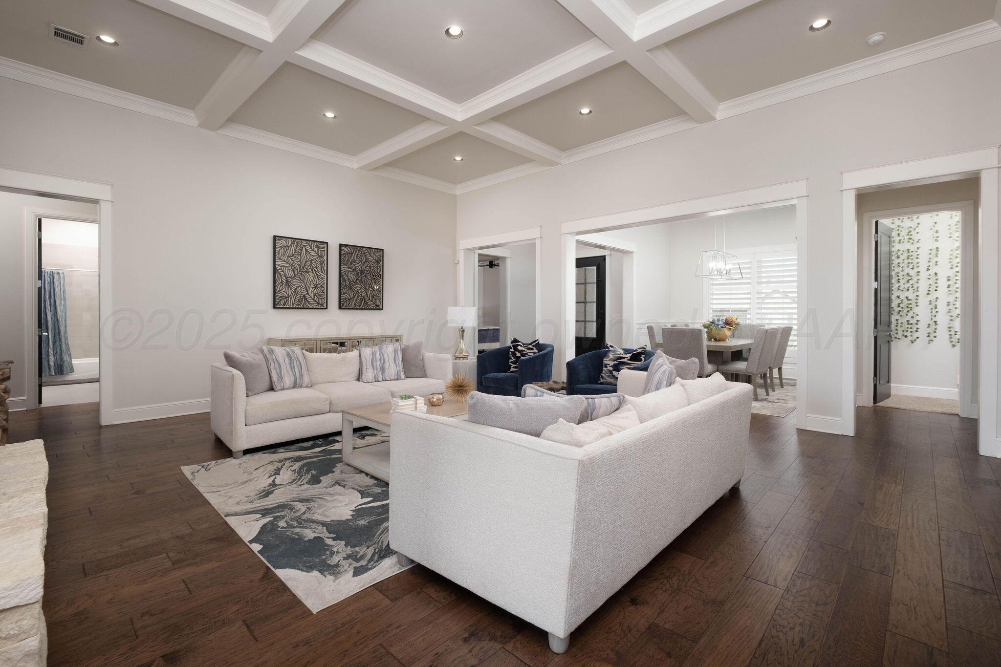 6103 Foley Square Street Amarillo, TX 79119 - Photo 13 of 52 a living room with furniture and a wooden floor