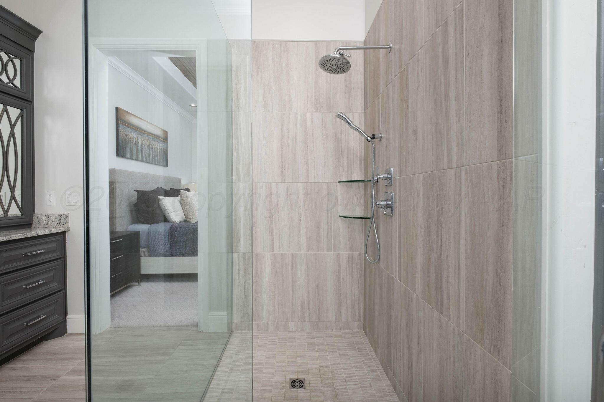 6103 Foley Square Street Amarillo, TX 79119 - Photo 32 of 52 a bathroom with a shower