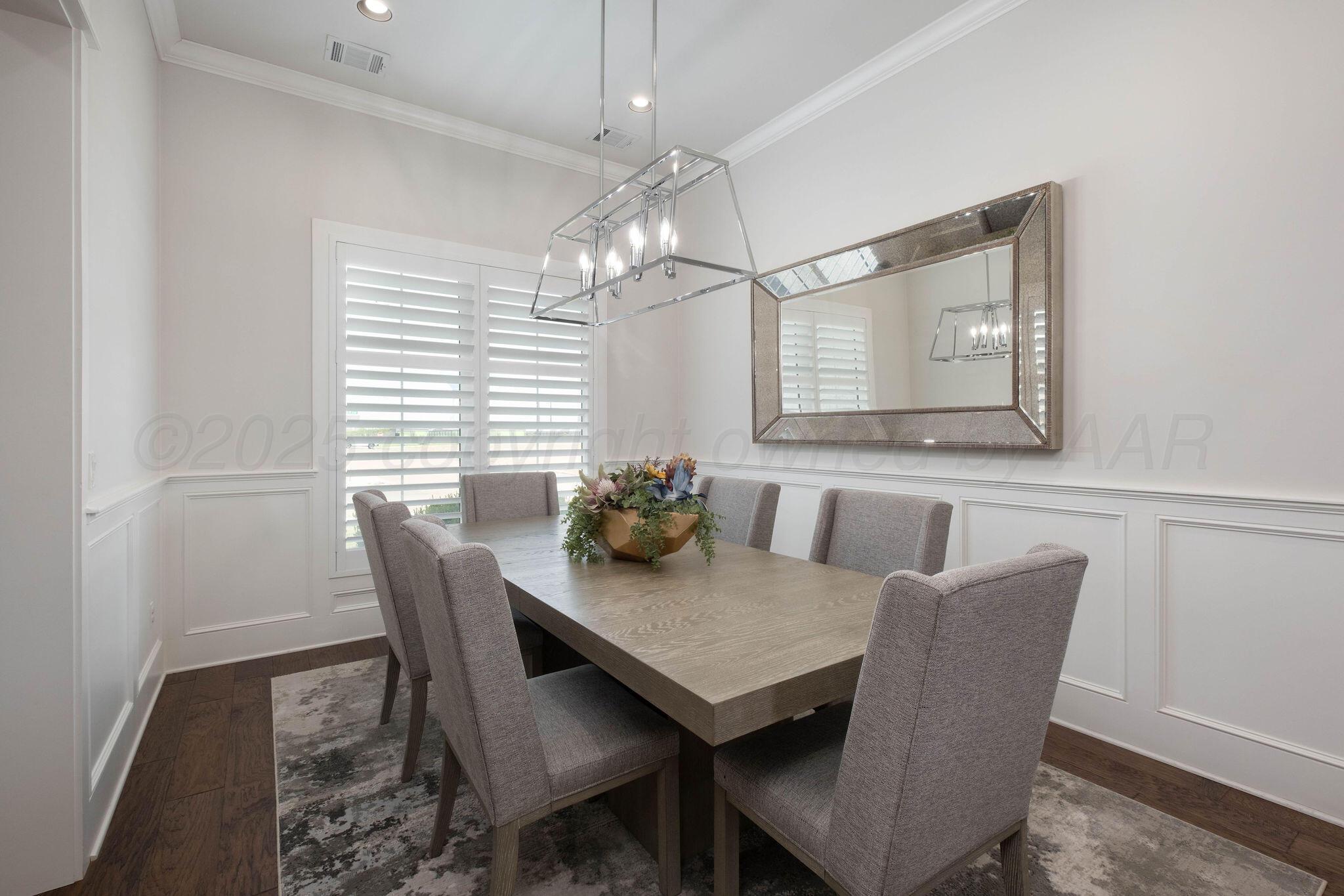 6103 Foley Square Street Amarillo, TX 79119 - Photo 8 of 52 a view of a dining room with furniture window and wooden floor