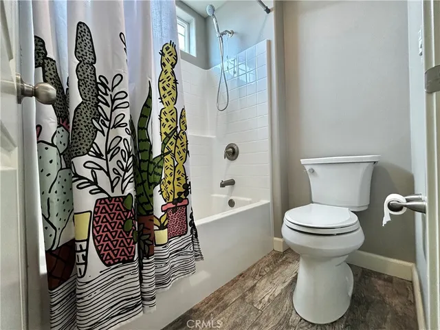 a bathroom with a toilet and sink